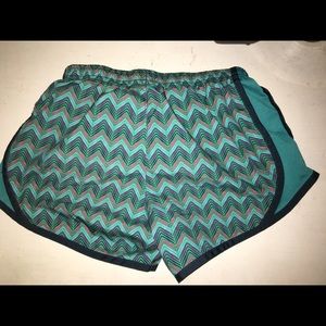 Medium in kids size, Nike running shorts